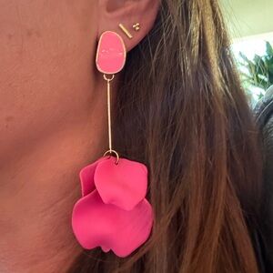 Pink dangle earrings.